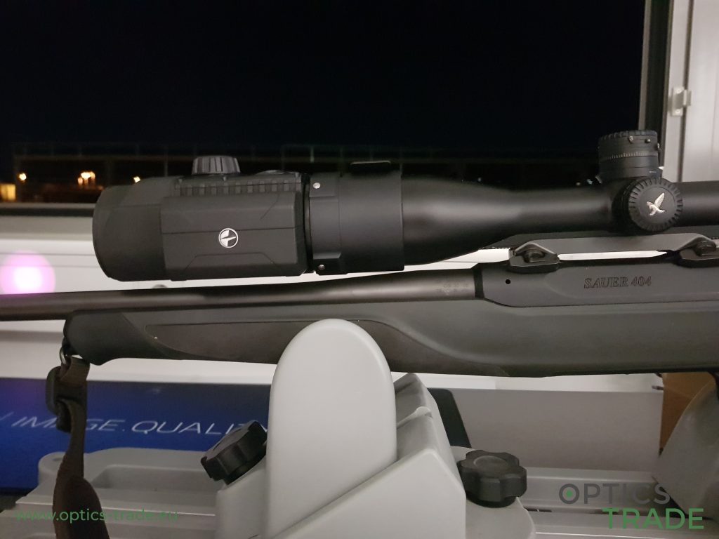 Pulsar F455, a digital night vision clip-on, mounted on a riflescope